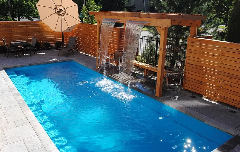 Low maintenance fiberglass pool installation Boise backyard with saltwater system and modern design