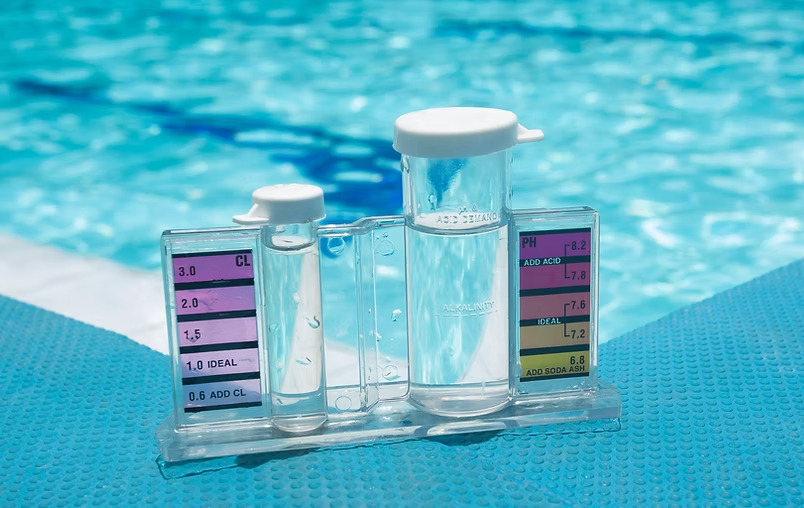 Fiberglass pool installation Boise Idaho backyard with completed concrete surround and modern pool design